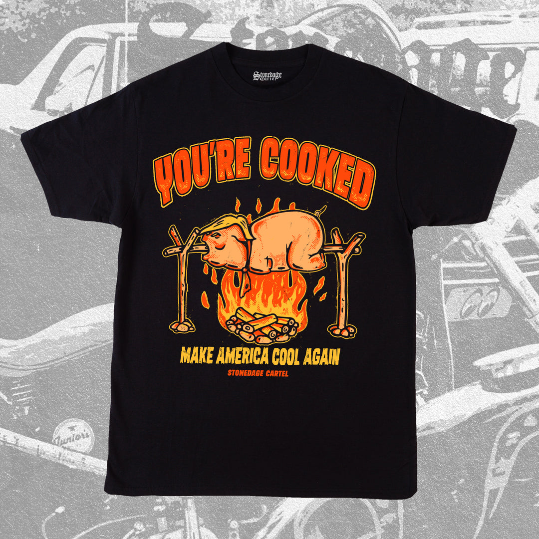 Black t-shirt with graphic design and text on a background with vintage Trump pig roast funny illustration