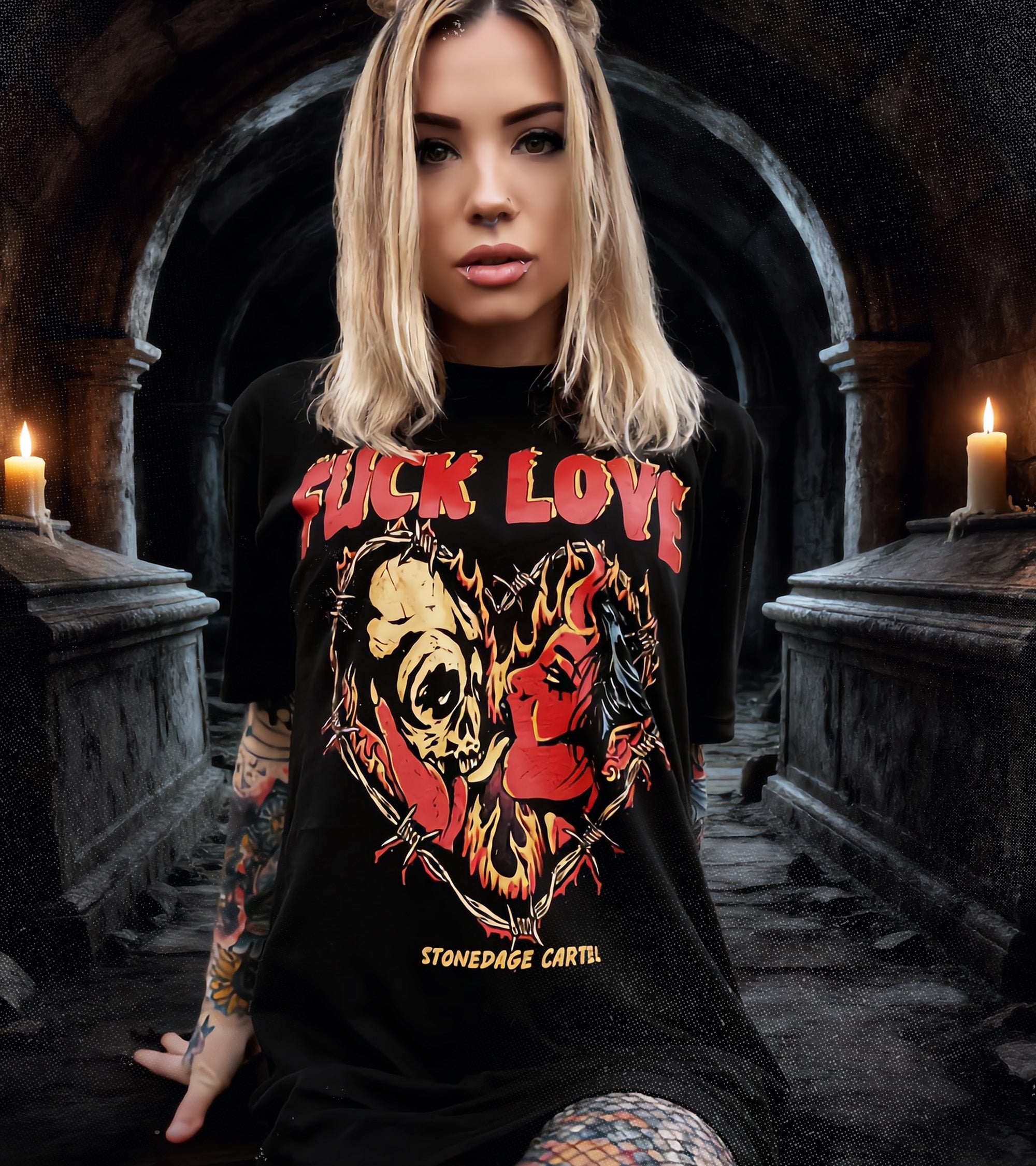 Person wearing a black t-shirt with graphic design and text in a dark, cathedral-like setting.