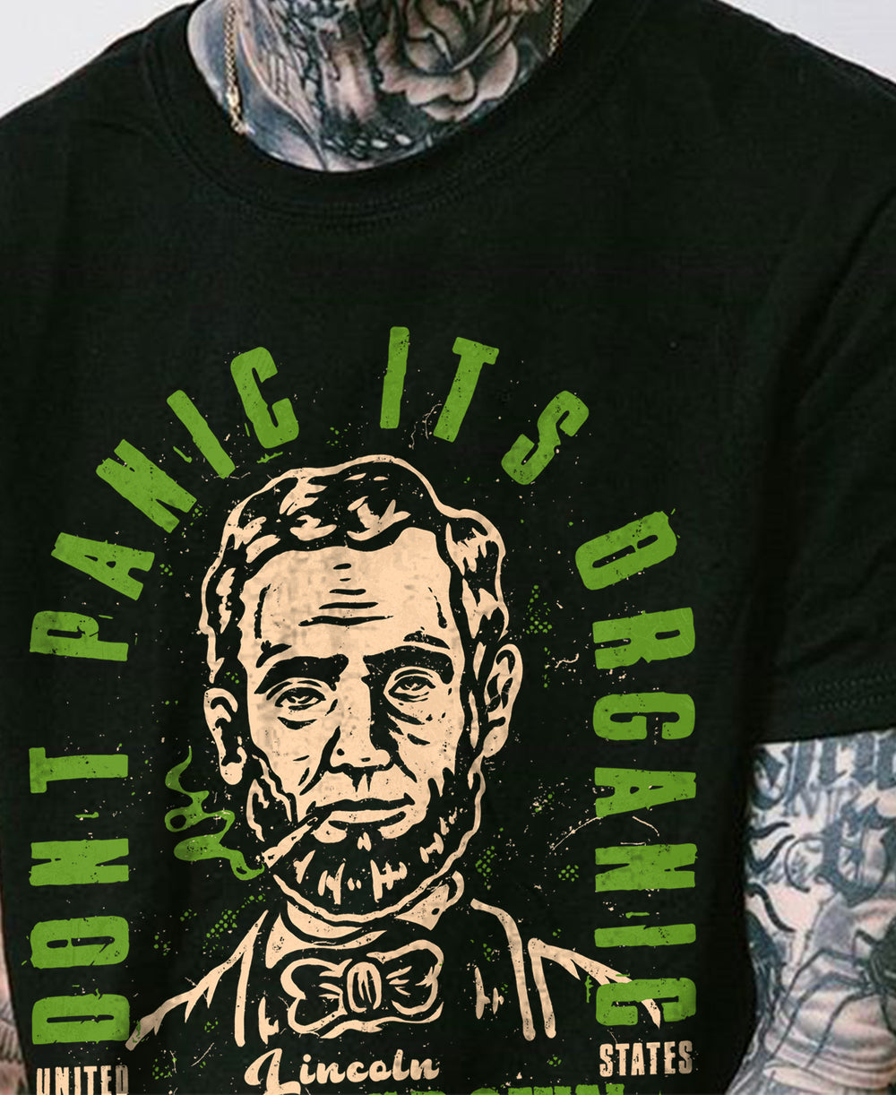Don't Panic It's Organic Unisex T-shirt, Funny Abraham Lincoln Smoking Weed Vintage Style Unisex T-shirt Model wearing black t-shirt