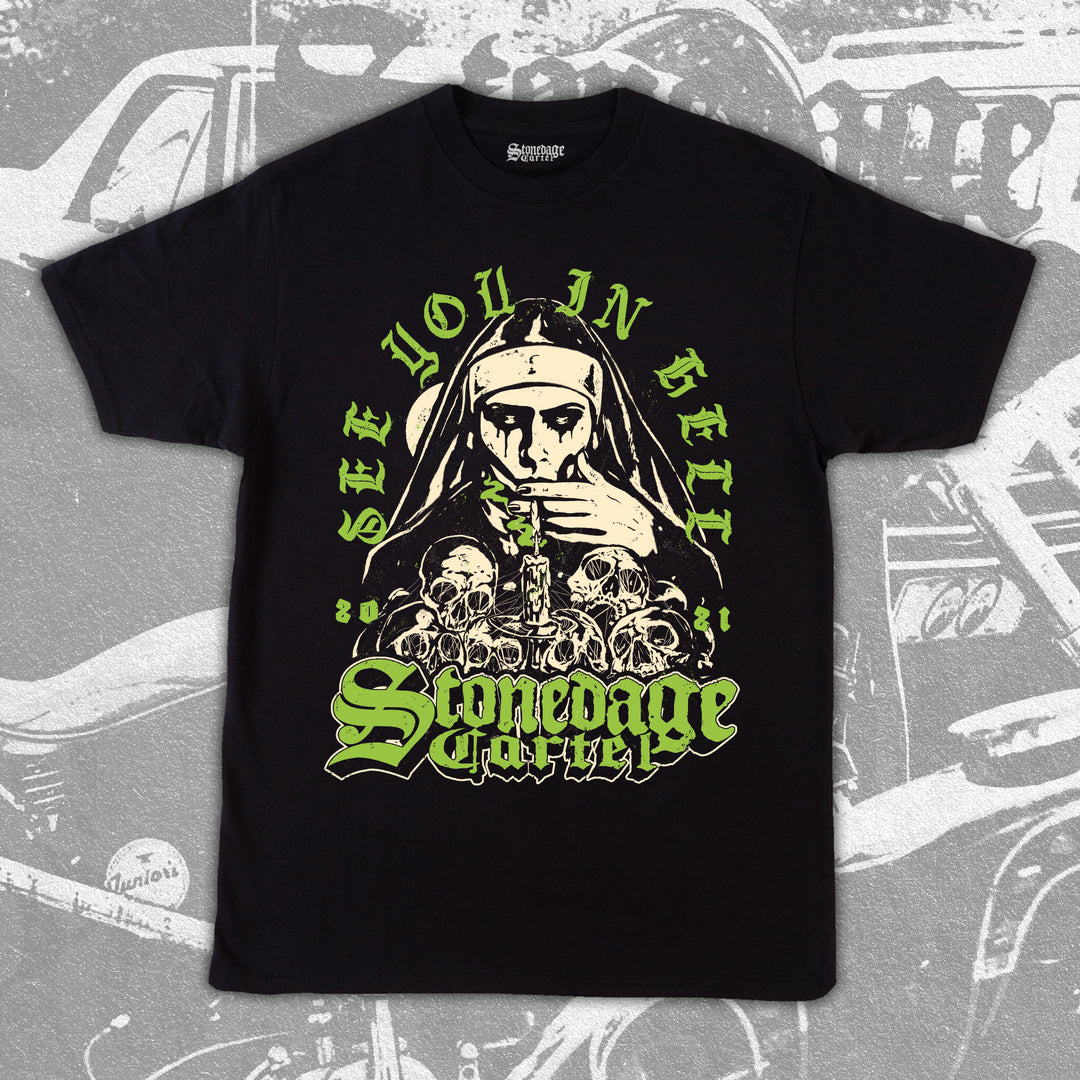 See You In Hell Unisex T-shirt, Nun Goth Smoking Weed on Pile Of Skulls Stonedage Cartel Clothing Brand.